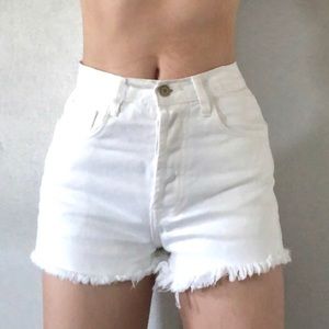 Brandy Melville white jean shorts.